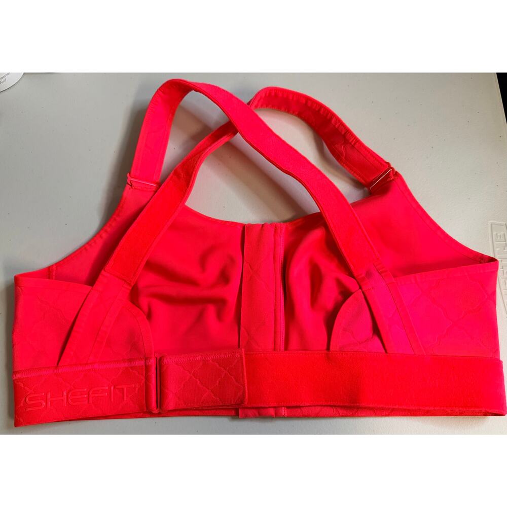SHEFIT Bright Coral Sports Bra 2Luxe Zip Front Adjustable Straps Cross NWOTBack - Picture 5 of 9